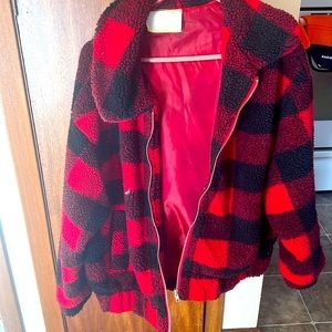 No longer need. Have too many clothes. Red black Sherpa jacket. Good condition